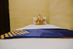 Economy Double Room | Free WiFi - SPOT ON 2387 Bukit Cemara Tidar Family (Malang)