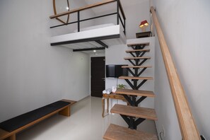 Deluxe-sviitti | Oleskelualue | 32–tuumainen taulutelevisio, jossa kaapelikanavat