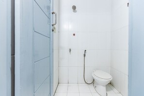 Habitación doble | Baño | Regadera y toallas 