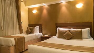 Superior Twin Room | Minibar, in-room safe, desk, laptop workspace