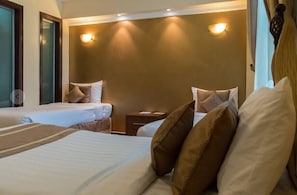 Superior Triple Room | Minibar, in-room safe, desk, laptop workspace - Summerdale Inn (Nairobi)