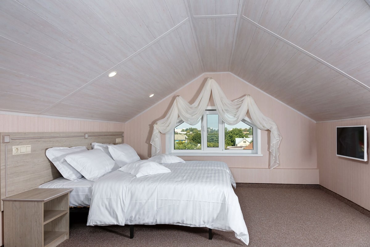Ropa de cama de alta calidad y cortinas blackout