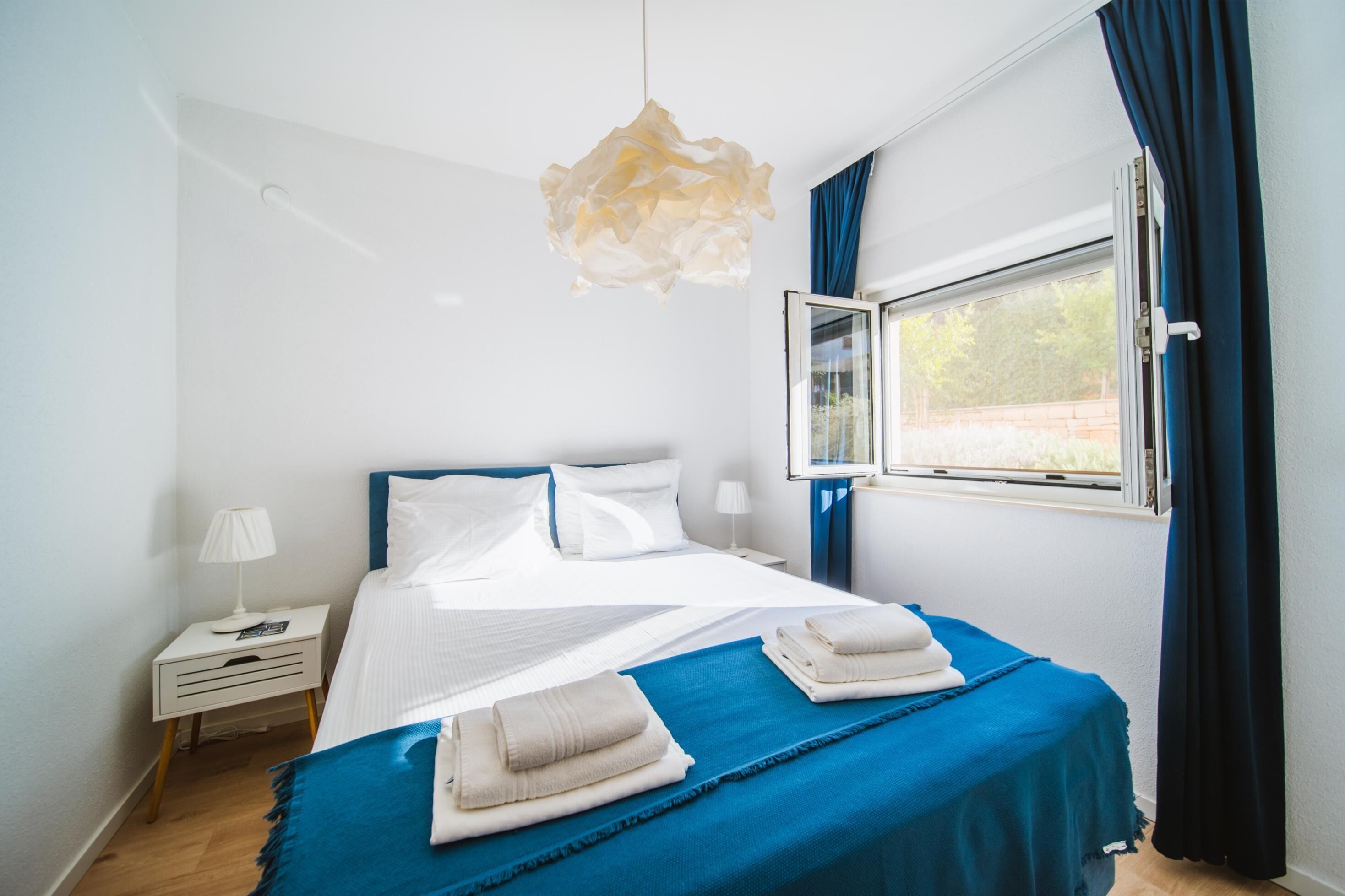 Classic Apartment, 1 Bedroom (A1) | Desk, blackout curtains, soundproofing, iron/ironing board