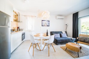 Classic Apartment, 1 Bedroom (B3) | Living area | 43-inch flat-screen TV with satellite channels, Smart TV - Villa Teuta (Korcula)