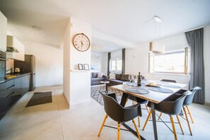 Comfort Apartment, 2 Bedrooms (A2) | Living area | 43-inch flat-screen TV with satellite channels, Smart TV - Villa Teuta (Korcula)