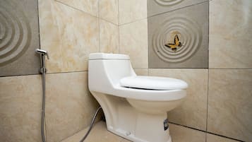 Economy Double Room | Bathroom | Shower, towels