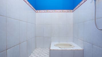 Habitación doble | Baño | Ducha y toallas