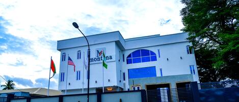 A modern building with a sign that reads "Montana."