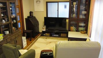42-inch flat-screen TV with cable channels, TV