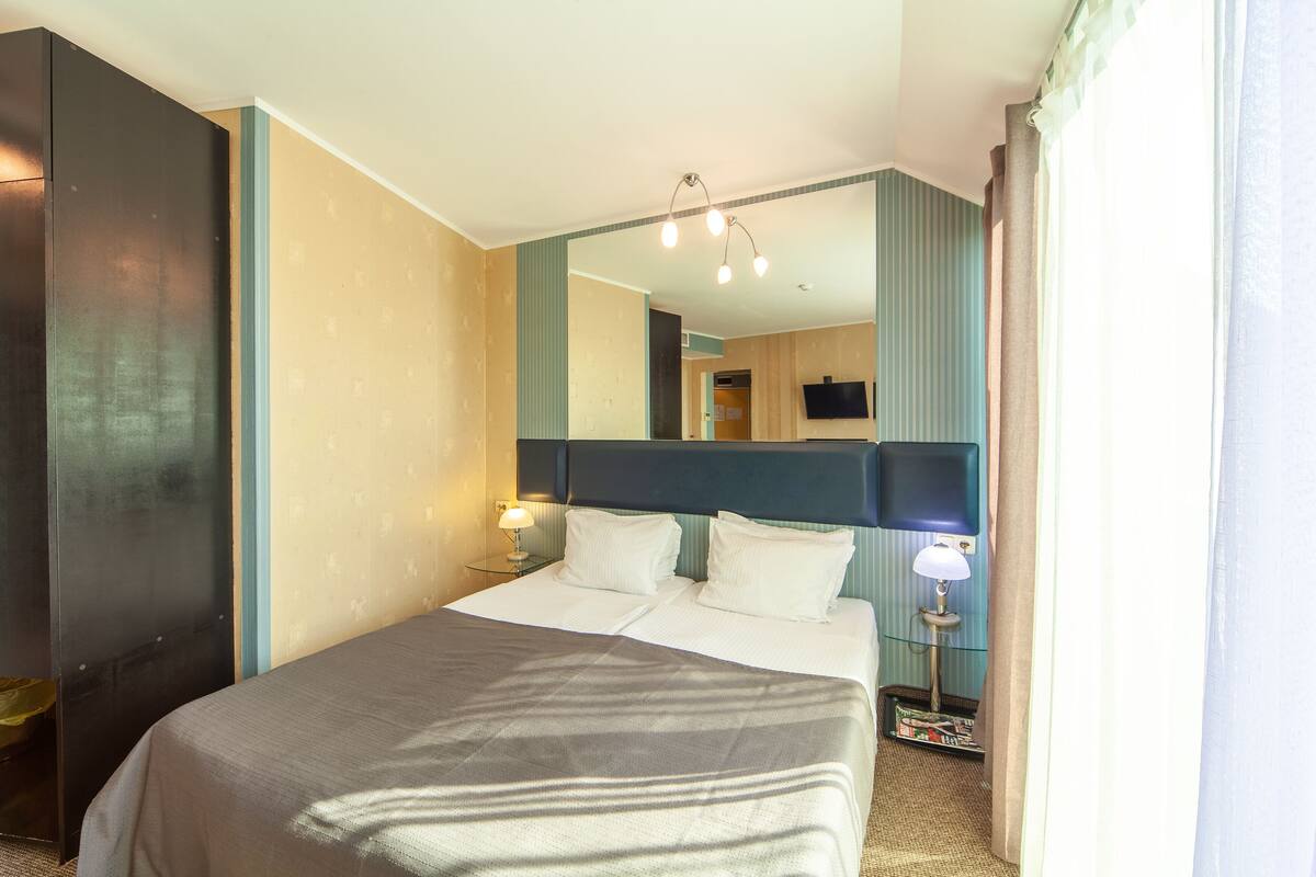 In-room safe, desk, laptop workspace, blackout curtains