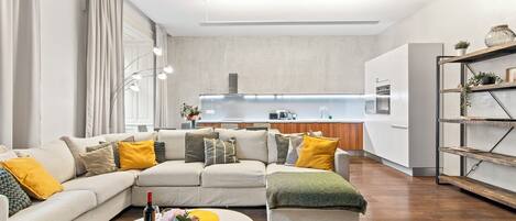 Comfort Apartment | Living area | 42-inch Smart TV with cable channels, TV, toys