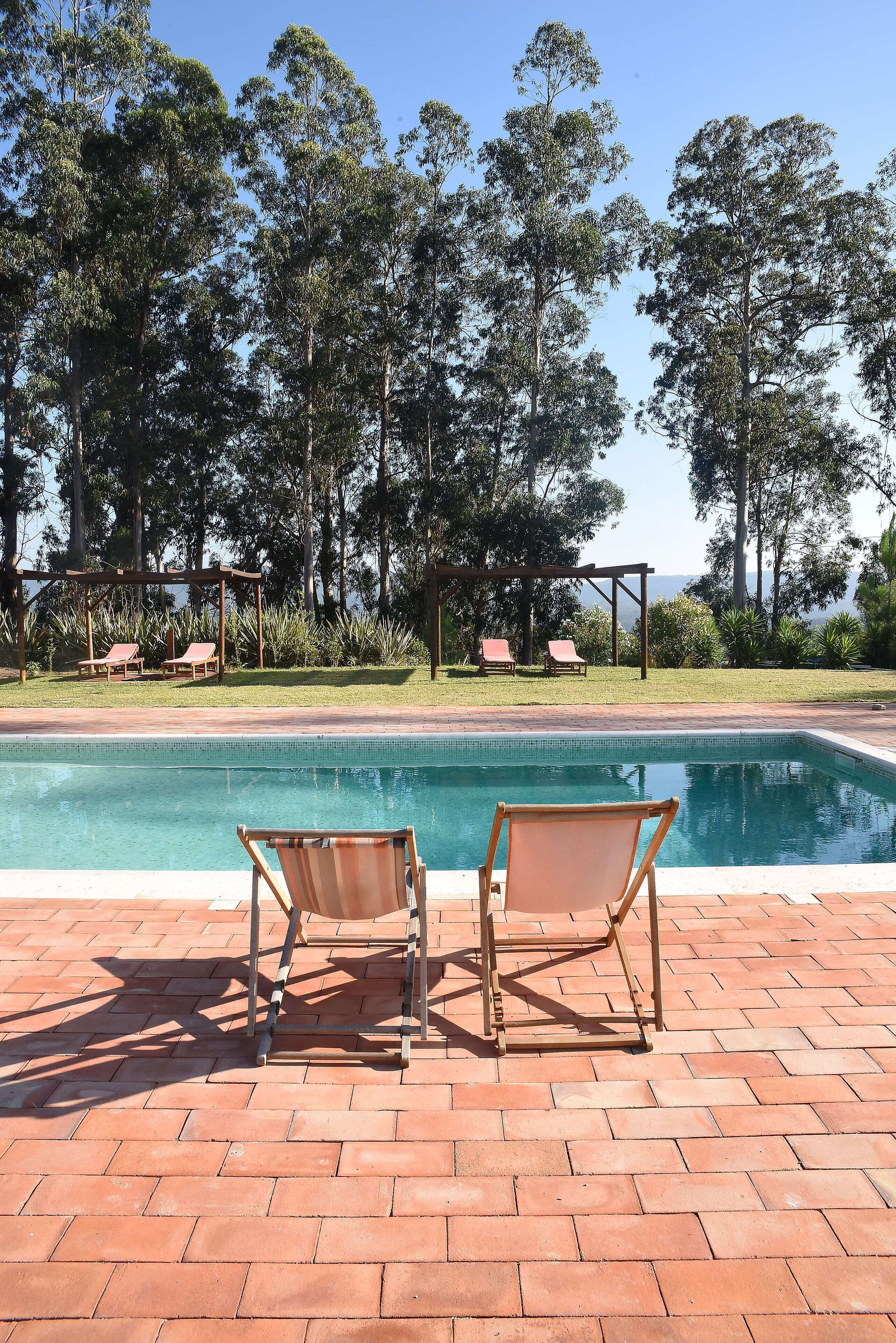 Outdoor pool, pool umbrellas, pool loungers