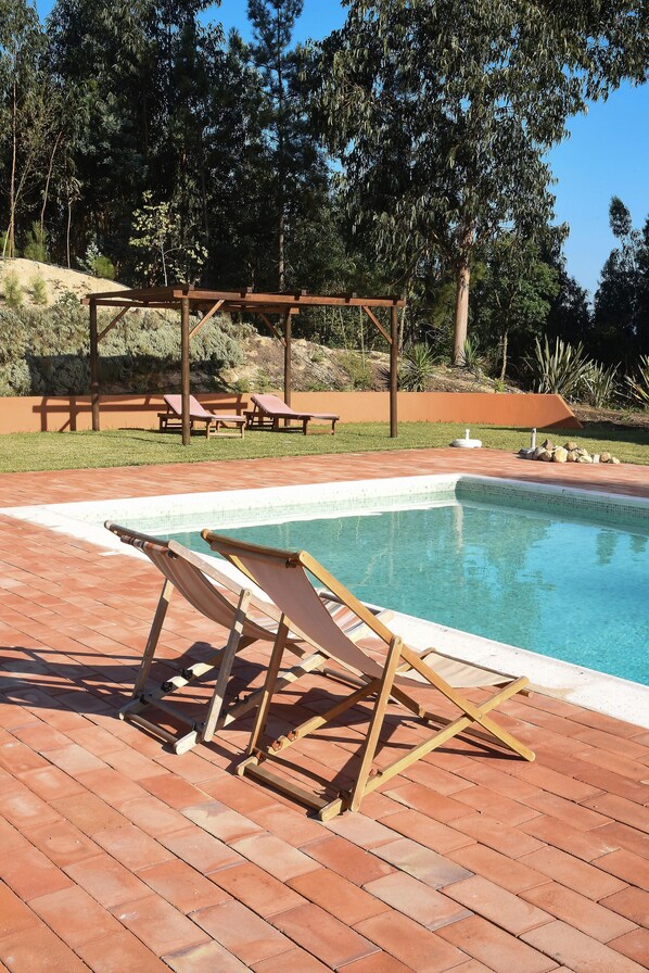 Outdoor pool, pool umbrellas, sun loungers