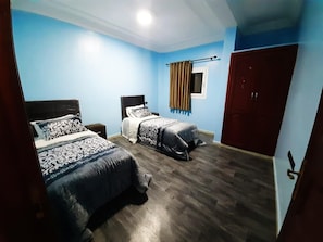 Appartement, 3 chambres | Rideaux occultants, lits pliants/supplémentaires, Wi-Fi gratuit