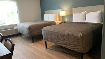 Desk, laptop workspace, free WiFi, bed sheets