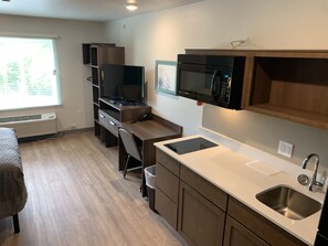 Desk, laptop workspace, free WiFi, bed sheets - WoodSpring Suites Atlanta McDonough (McDonough)