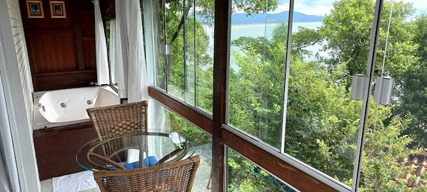 Triple Room | Living area | Flat-screen TV