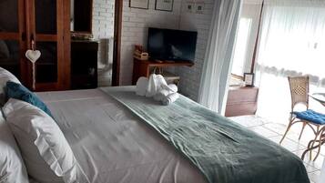 1 habitación, minibar y ropa de cama