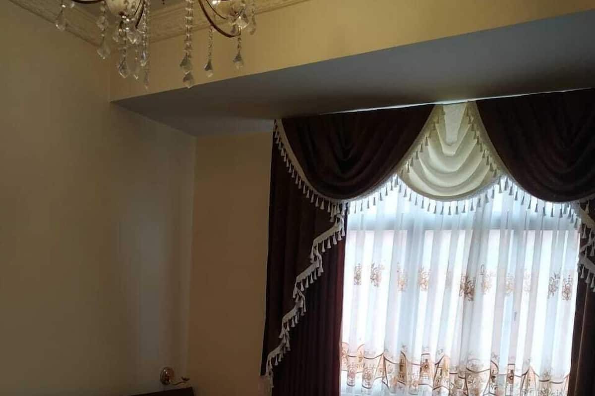 Economy Double Room, 1 Double Bed, Shared Bathroom | In-room safe, individually furnished, desk, laptop workspace