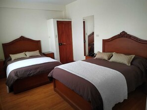 Family Quadruple Room, 2 Double Beds, Private Bathroom | In-room safe, individually furnished, desk, laptop workspace - Hostal Bellavista Inn and Hostal Terrabella S.R.L. (La Paz)