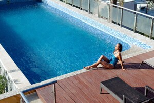 Outdoor pool, open 8:00 AM to 10:00 PM, pool umbrellas