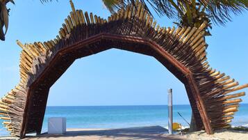 On the beach, surfing, rowing