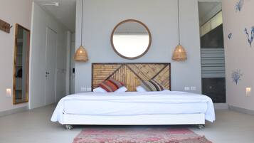 Suite, Ocean View | Blackout drapes, free WiFi, bed sheets