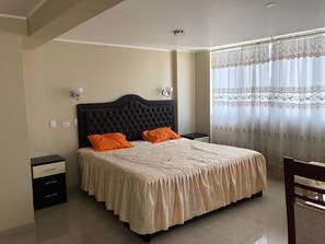 Exclusive Room | Individually furnished, free WiFi, bed sheets - Hotel El Monarca Suite (Moquegua)