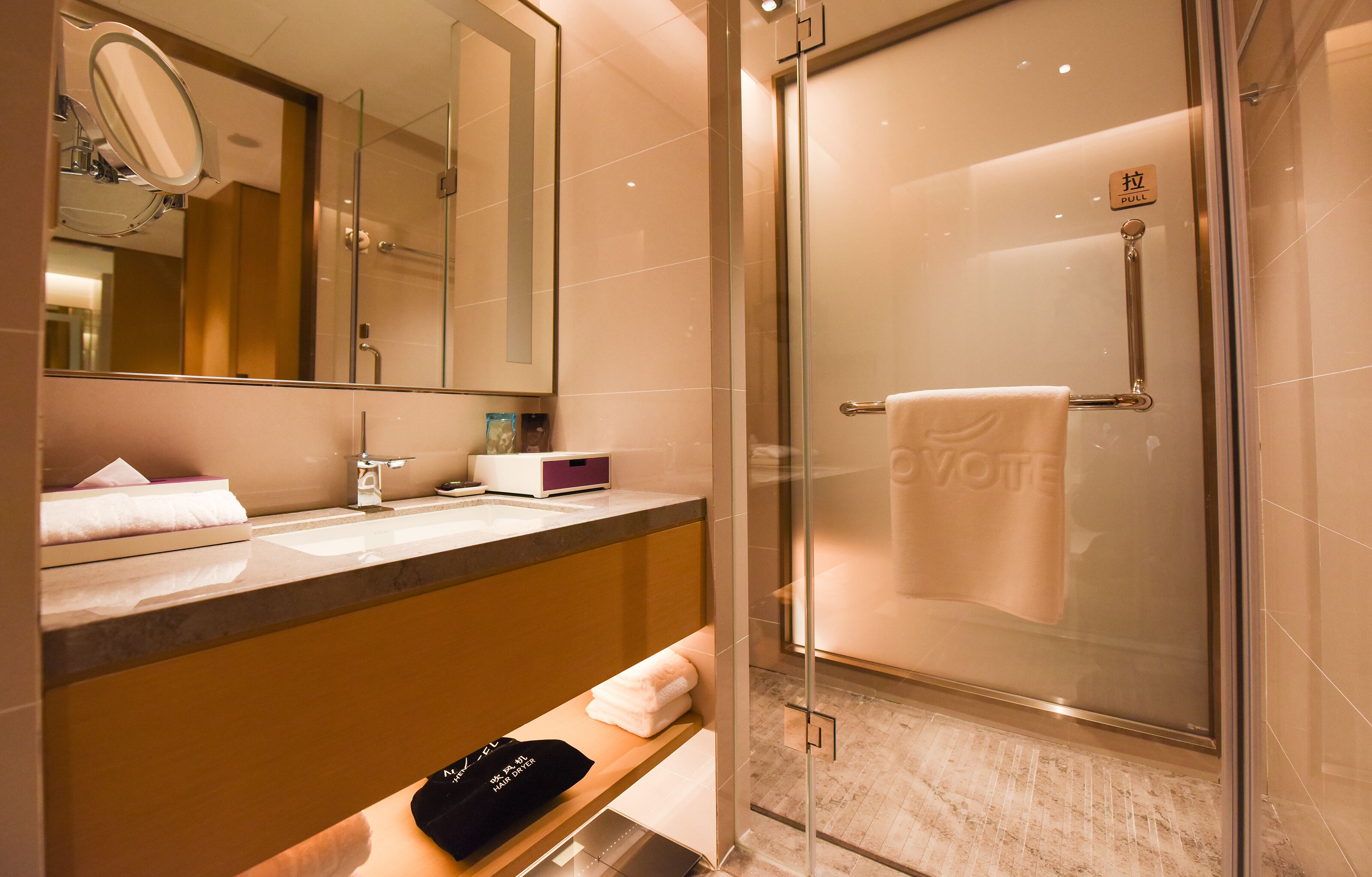 rainfall showerhead, designer toiletries, hair dryer, bathrobes