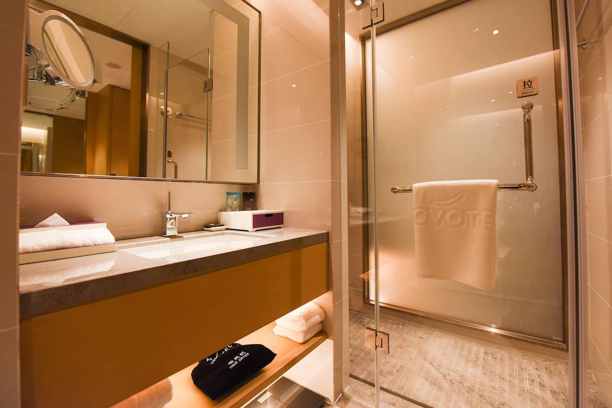 rainfall showerhead, designer toiletries, hair dryer, bathrobes