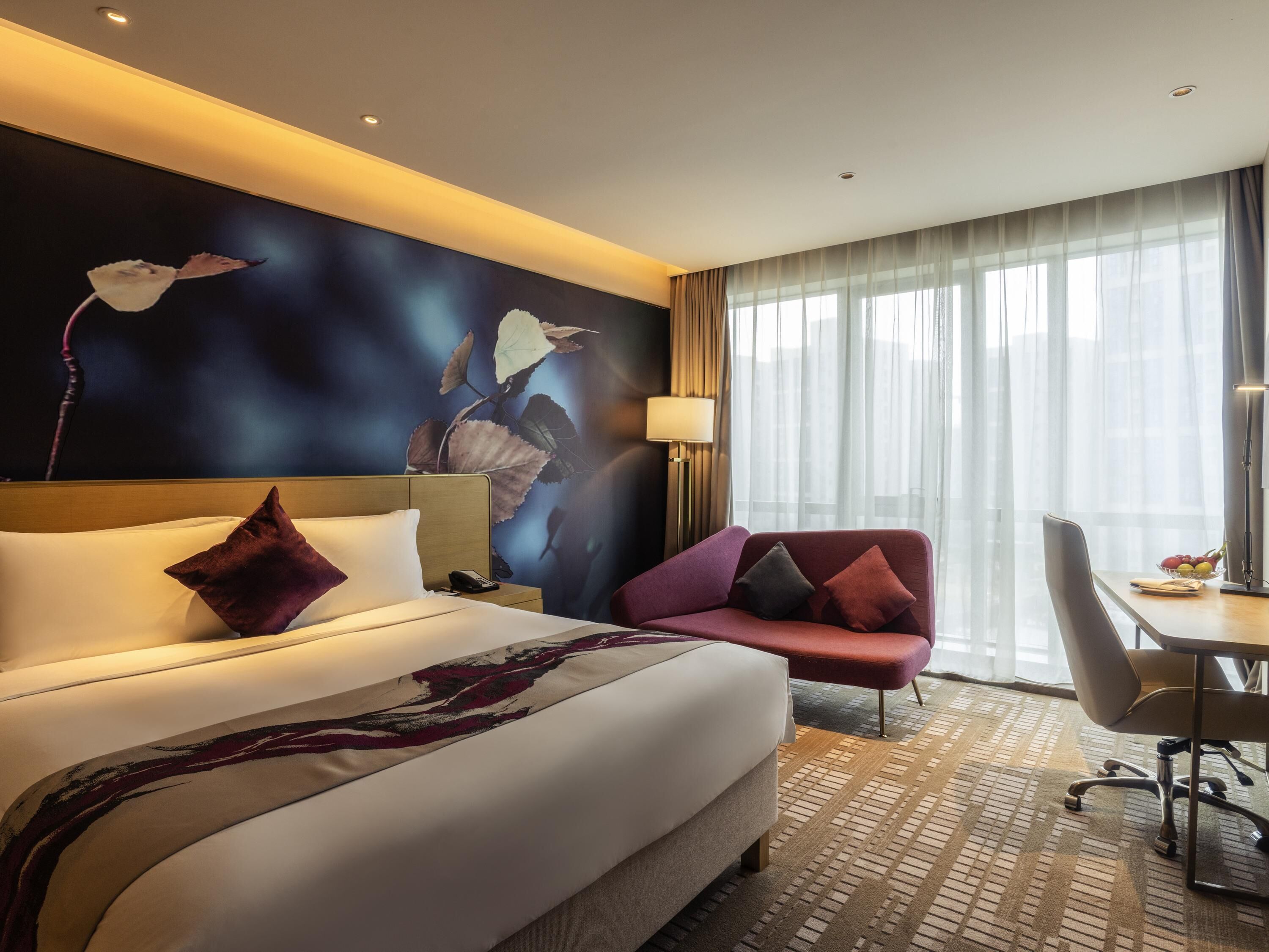 Premium bedding, down comforters, pillowtop beds, minibar