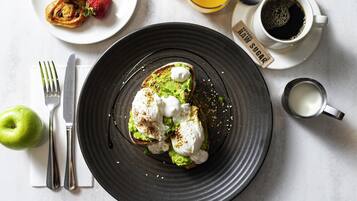 Daily buffet breakfast (AUD 27 per person)