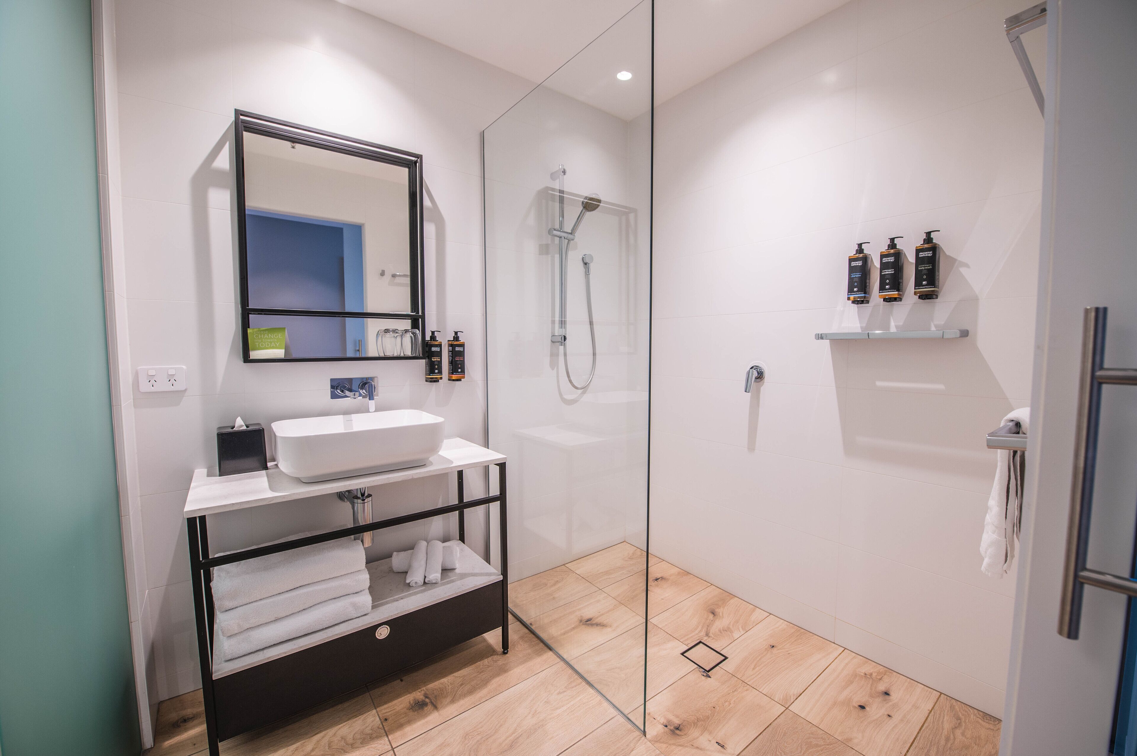 shower, eco-friendly toiletries, hair dryer, towels