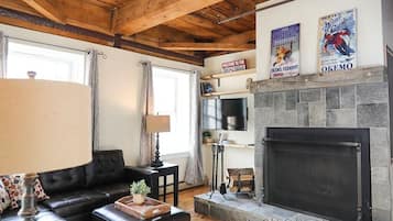 Smart TV, fireplace, books