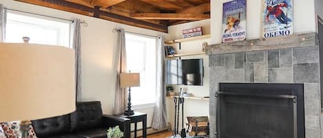 Smart TV, fireplace, books