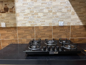 Standard Twin Room, 1 Bedroom | Private kitchen | Fridge, coffee/tea maker, eco-friendly cleaning products, paper towels