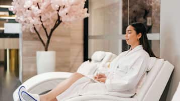 Relax in comfort, surrounded by natural beauty, with a reclining chair and refreshing drinks at hand.