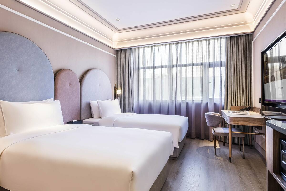 Standaard kamer, 2 eenpersoonsbedden | Een minibar, een kluis op de kamer, een bureau