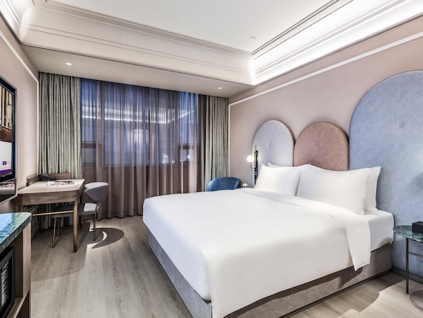 Standaard kamer, 1 kingsize bed | Een minibar, een kluis op de kamer, een bureau