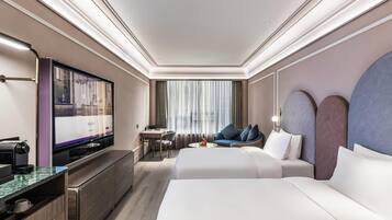 Habitación Deluxe, 2 camas individuales | Minibar, caja de seguridad en la habitación y escritorio