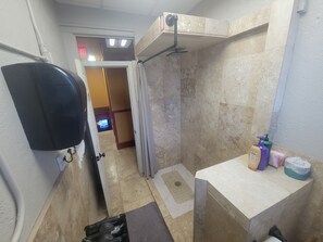 Shower, towels, shampoo