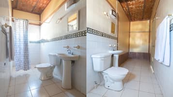 Habitación superior | Baño | Regadera, amenidades de baño gratuitas, toallas, jabón