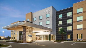 A modern hotel with a flat roof, a stone facade, and a sign reading "Fairfield by Marriott". - Fairfield Inn & Suites by Marriott Tampa Riverview (Riverview)