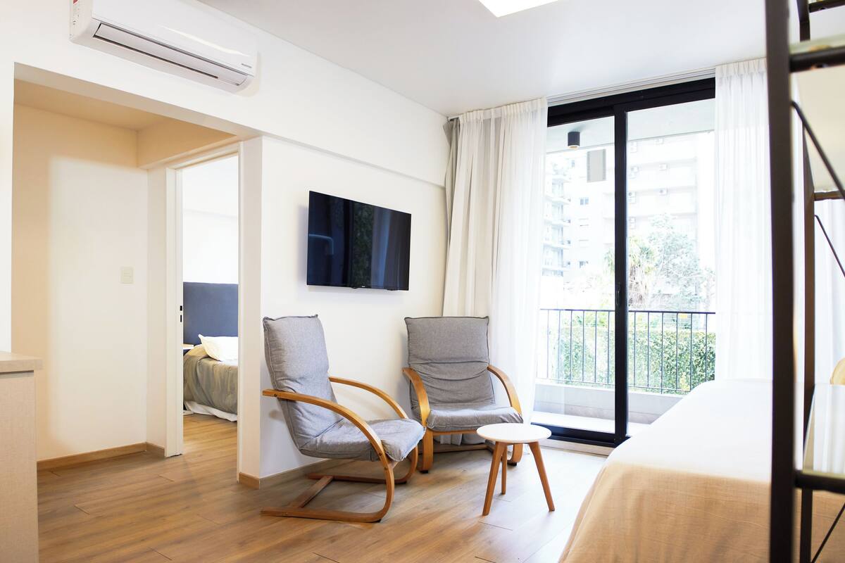 Apartamento Premium | 1 dormitorio, cortinas opacas, tabla de planchar con plancha