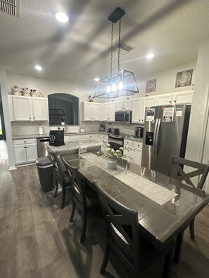Fridge, microwave, oven, stovetop - Disney-Themed 5-Star Rated Family Home with Pool, Spa, Game Room,  & Near Parks! (Kissimmee)