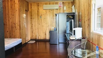 Habitación cuádruple Deluxe | Escritorio, wifi gratis, ropa de cama