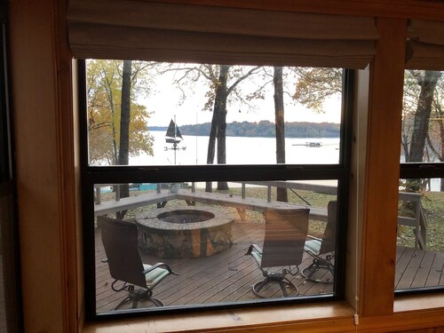 Large private acreage, very open space, decks, hot tub, treehouse, dock, more.