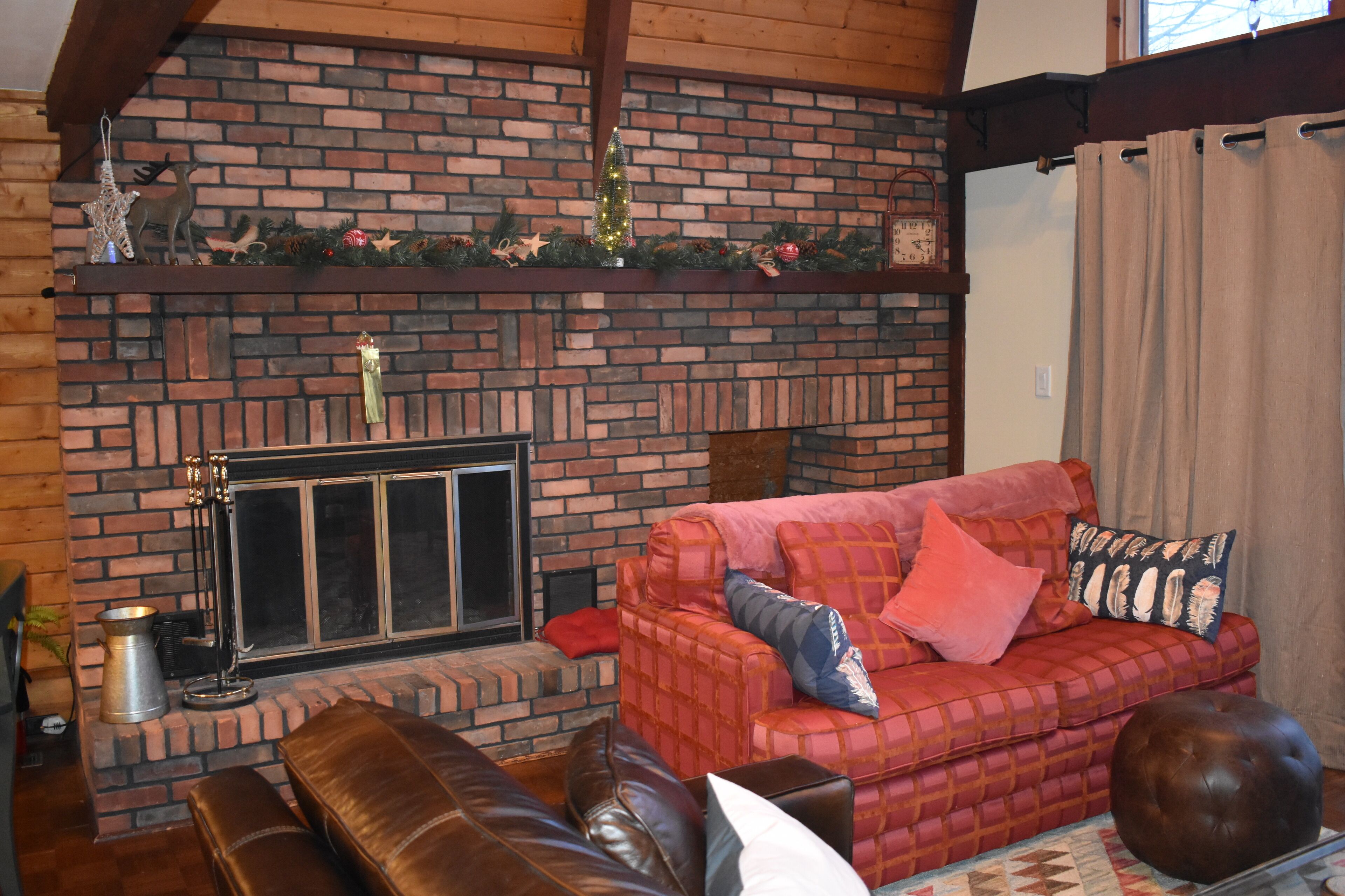 Living Room with wood burning fireplace.