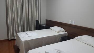 Habitación Deluxe con 1 cama matrimonial o 2 individuales | Minibar, escritorio, espacio para trabajar con laptop y wifi gratis