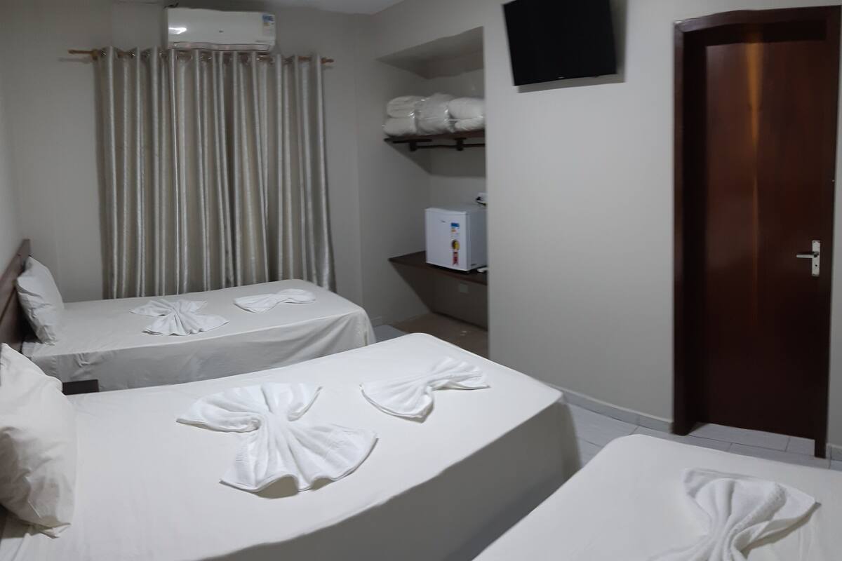 Deluxe Triple Room | Minibar, desk, laptop workspace, free WiFi